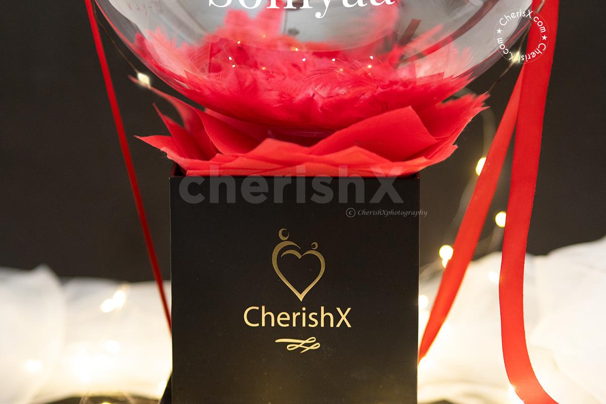 Celebrate this Valentine's Day and week beautifully with CherishX's Exclusive Red Feathers Valentine's Special Bucket  Gift!
