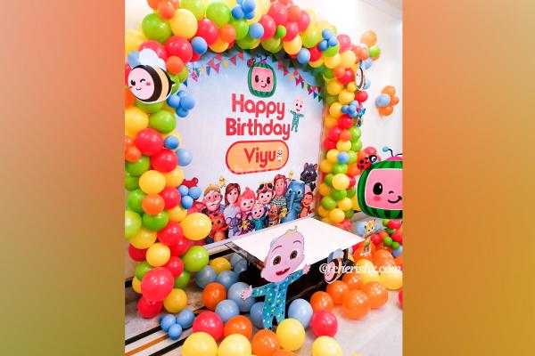 CherishX's Cocomelon Themed Kid's Birthday Decor includes colourful balloons and themed cut-outs