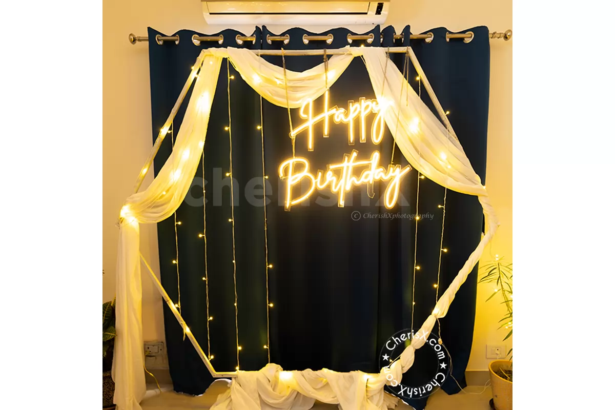 An elegant White Theme Neon Light Decor with Hexagon Backdrop designed for  Birthdays, Anniversaries and more in your city.