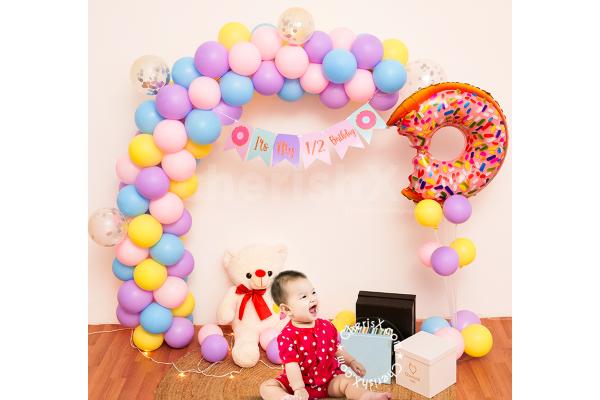 A Unique Donut themed birthday decoration for your child's half birthday!