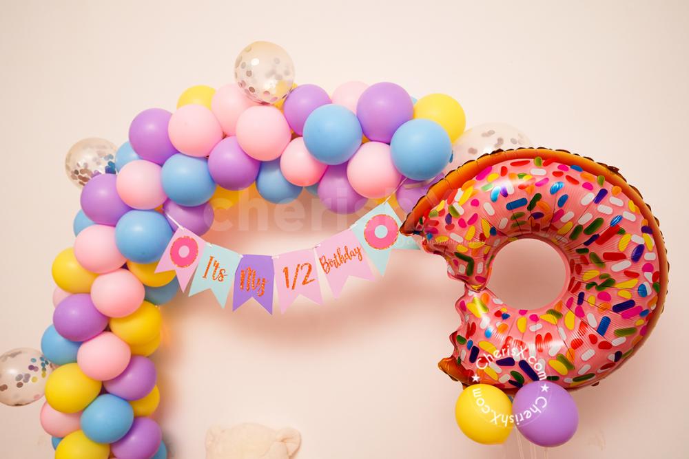 Celebrate your kid's half birthday with CherishX's Donut themed Birthday Decoration!
