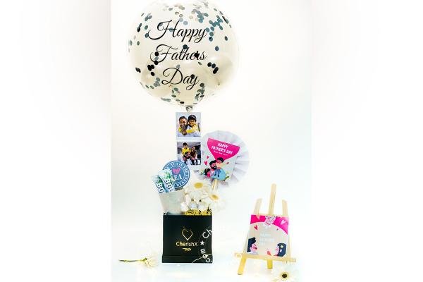 Make your father feel special with CherishX's White Themed Balloon Bucket!