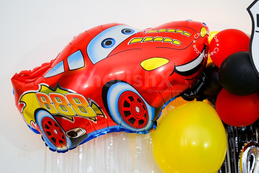 Arrange a fun birthday party for your kid with CherishX's Mcqueen themed birthday decor!