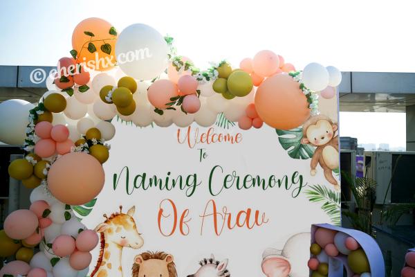 Let your baby naming ceremony be grand with CherishX's Jungle theme naming ceremony decor!