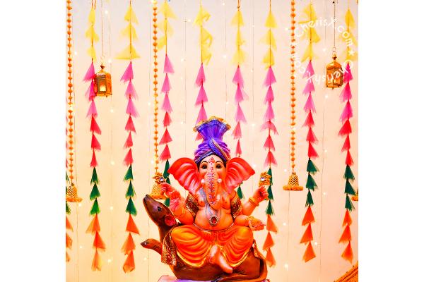 Ganesh Murti placed in the center of the Tassel Themed Decor by CherishX!