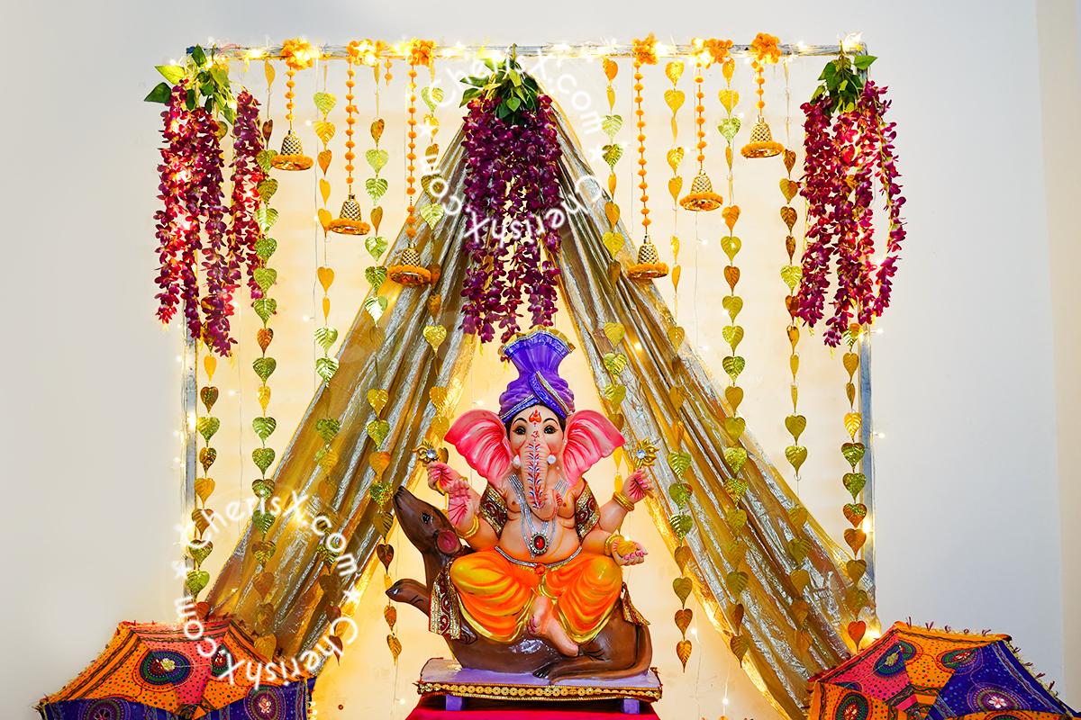 A Shimmer Golden Theme Ganpati Decor for Ganesh Chaturthi ...