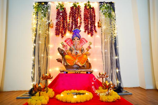 Ganpati Bappa Decoration with LED Lights and Flowers Backdrop