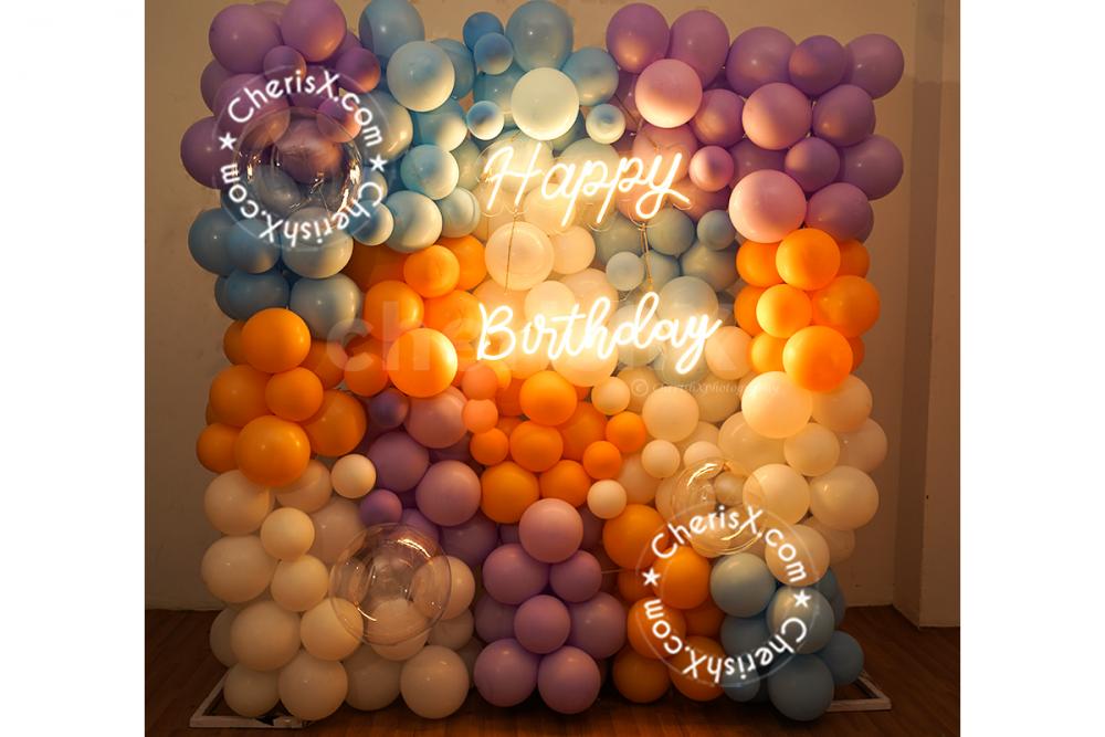 The fun pastel colour palette of the balloon decor is sure to be a hit.