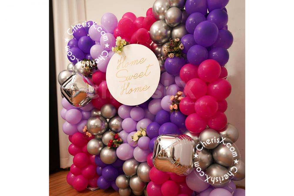 The shades of purple make for a beautiful aesthetic for the housewarming celebration