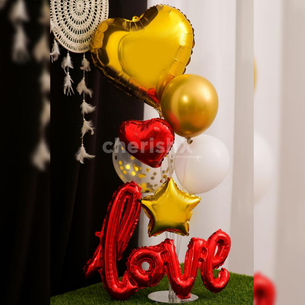Showcase your love with the most exclusive gift idea of a red and golden love bouquet