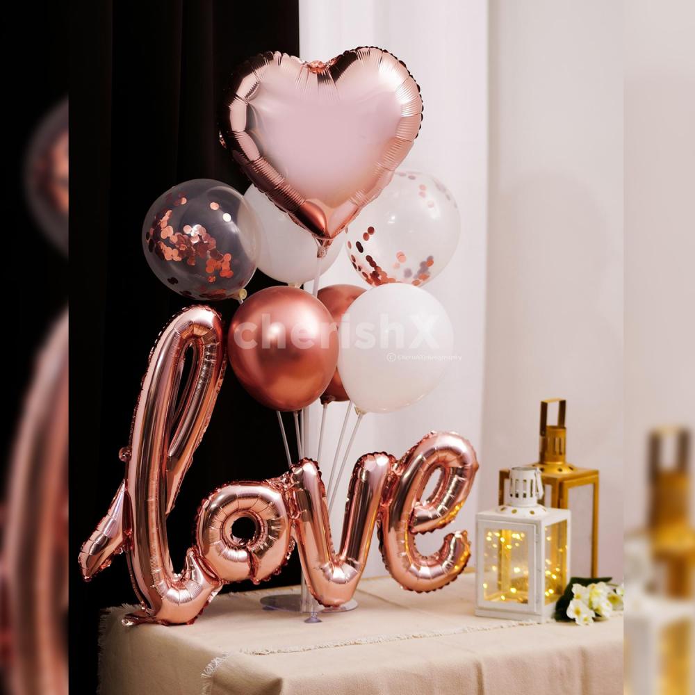 Elegance and classy are the best describing elements of this special rose gold love balloon bouquet