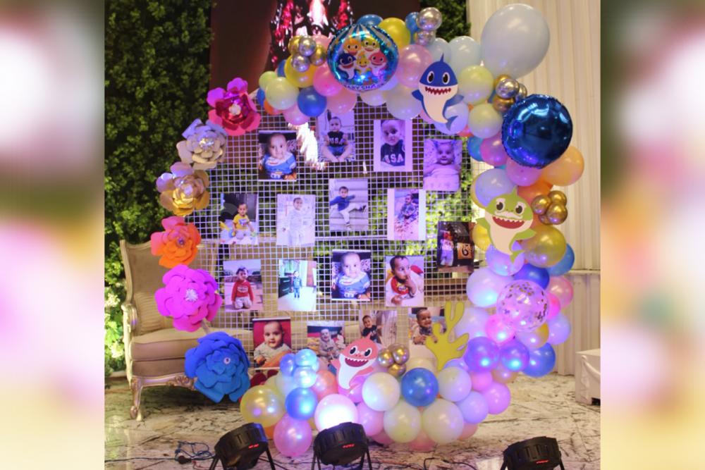 Personalize your birthday celebration with a cake table and balloons decorated as per your kid's choice