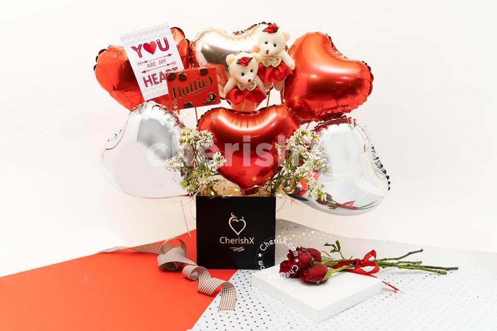 Surprise him or her with a wonderful Valentine's Hearts of Love Balloon Bouquet!