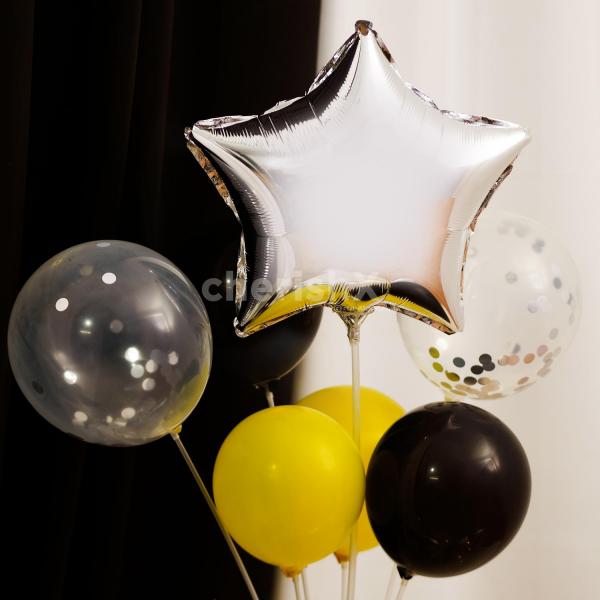 The 2 latex black balloons added to the bouquet give it an edgy look