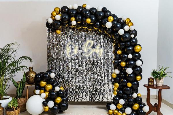 Click amazing snaps with a Sequins panel background Gold and Black Baby Shower Decor!