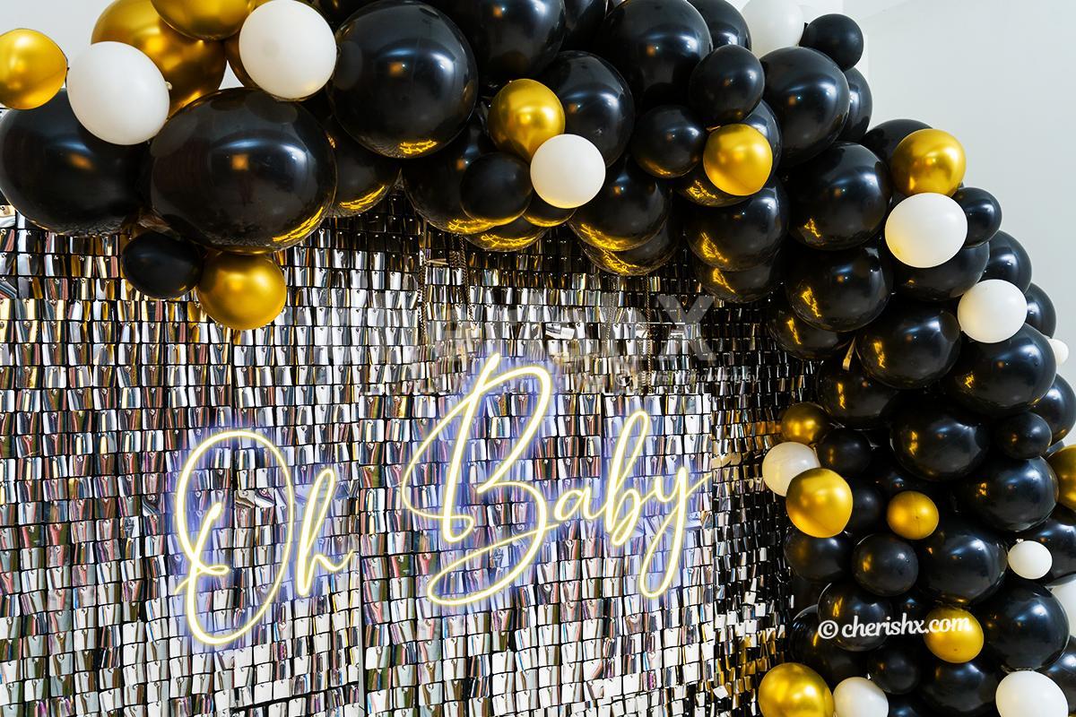 Plan a grand baby shower celebration with CherishX's Black and Gold themed premium sequins decor!
