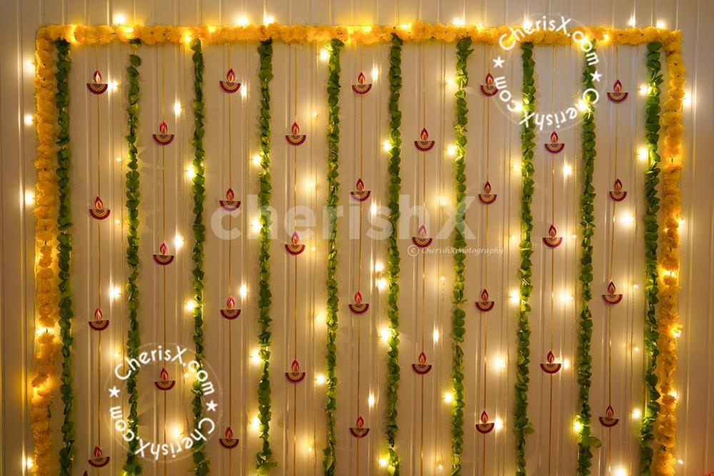 Flower garlands can complete the blank wall space