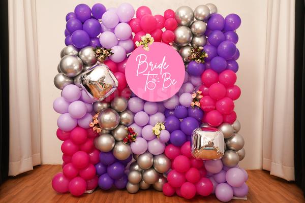 Have an unforgettable bridal shower with these special purple and silver balloon decorations.