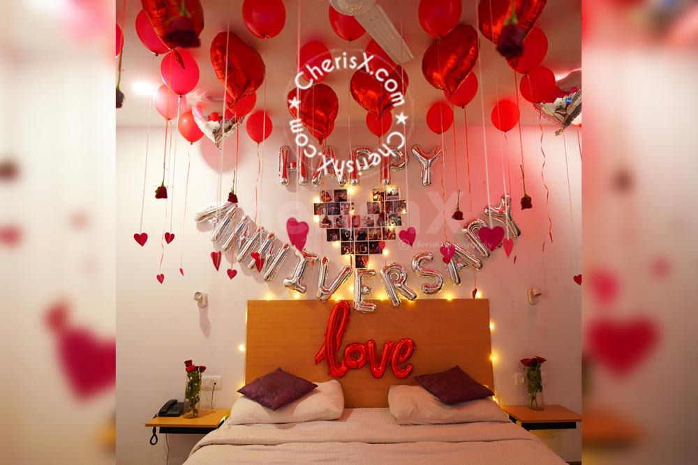 What better way of celebrating your anniversary than with these lovely red roses and balloons
