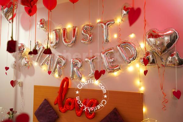 The red roses and balloons compliment your feelings and love