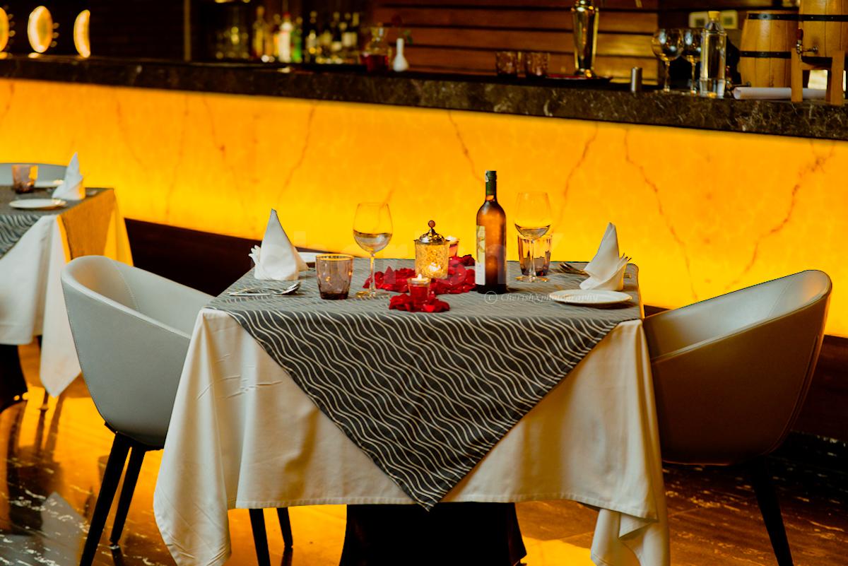 A candlelight dinner at Tatva by Country Inn is sure to be an