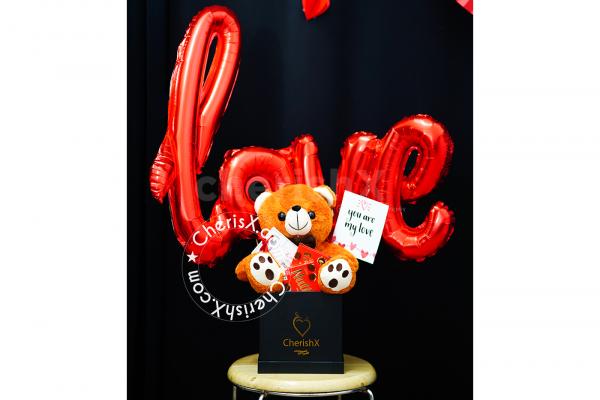 The cute teddy bucket can be personalized with a message of your choice.