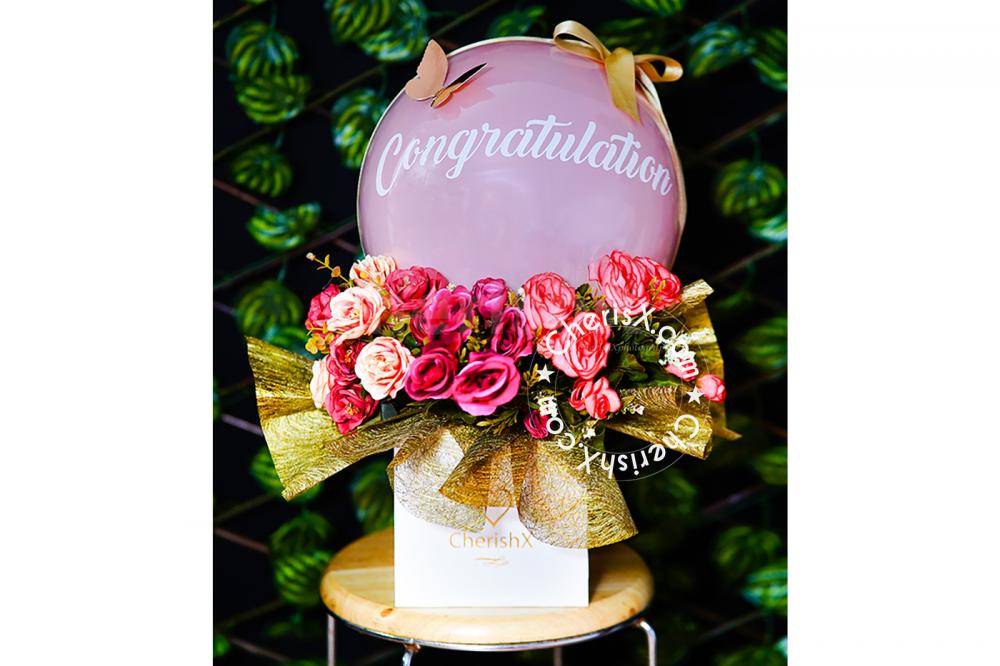 A perfect gift for a baby shower is Pastel Pink Flower Bucket.
