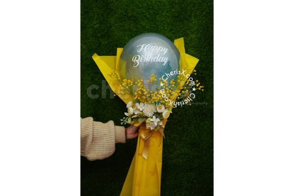 Make this birthday extraordinary by gifting the unique yellow and white glitter balloon bouquet