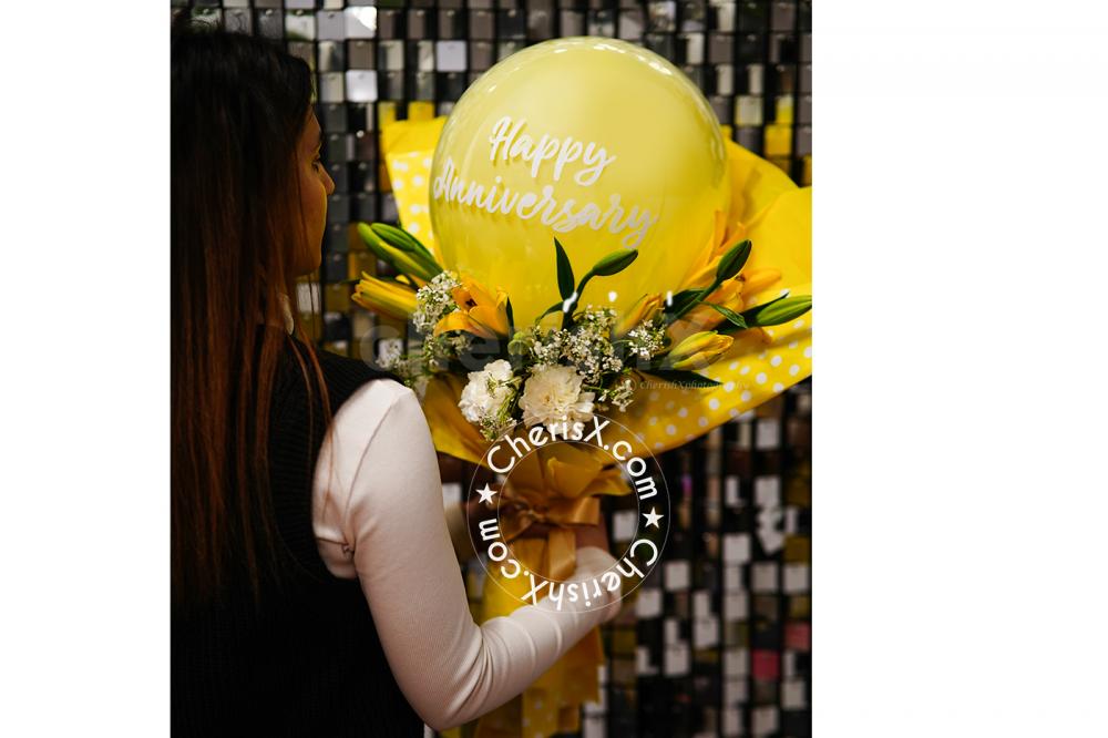 The yellow balloon bouquet is a gift that anyone will fall in love with