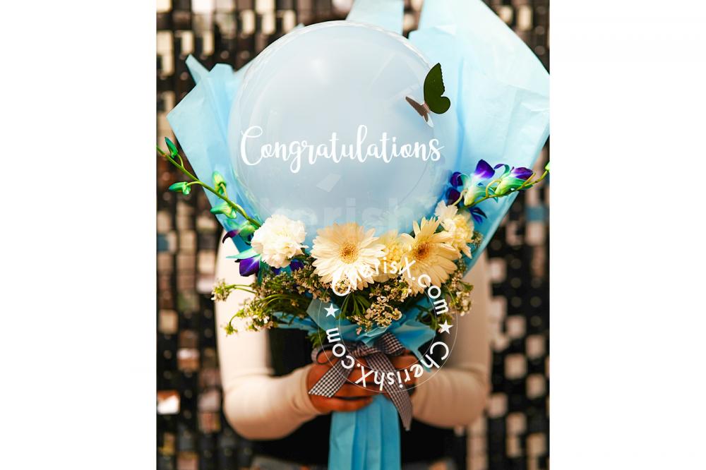 Add charm to your welcome celebrations with this remarkable bouquet