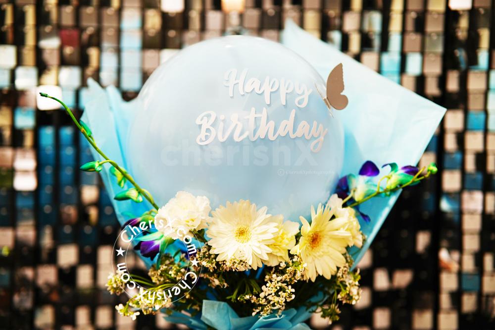 The blue charm birthday bouquet will instil the best memories and happiness for the day