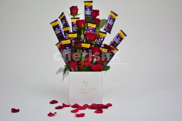Send a bucket full of roses and chocolates to wish someone a birthday or anniversary.