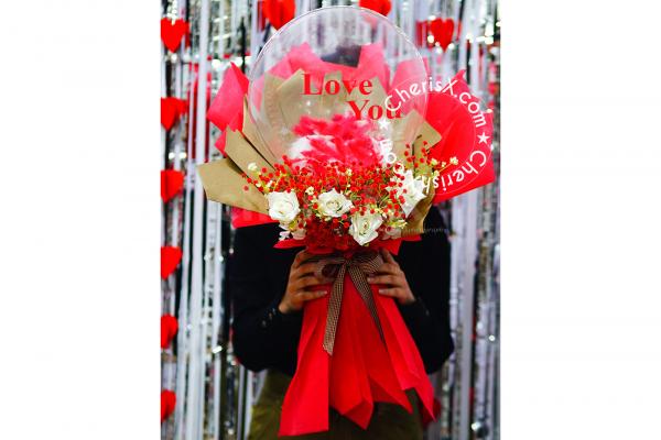 The Love You Red Flower Balloon Bouquet will make a great and lasting impression.
