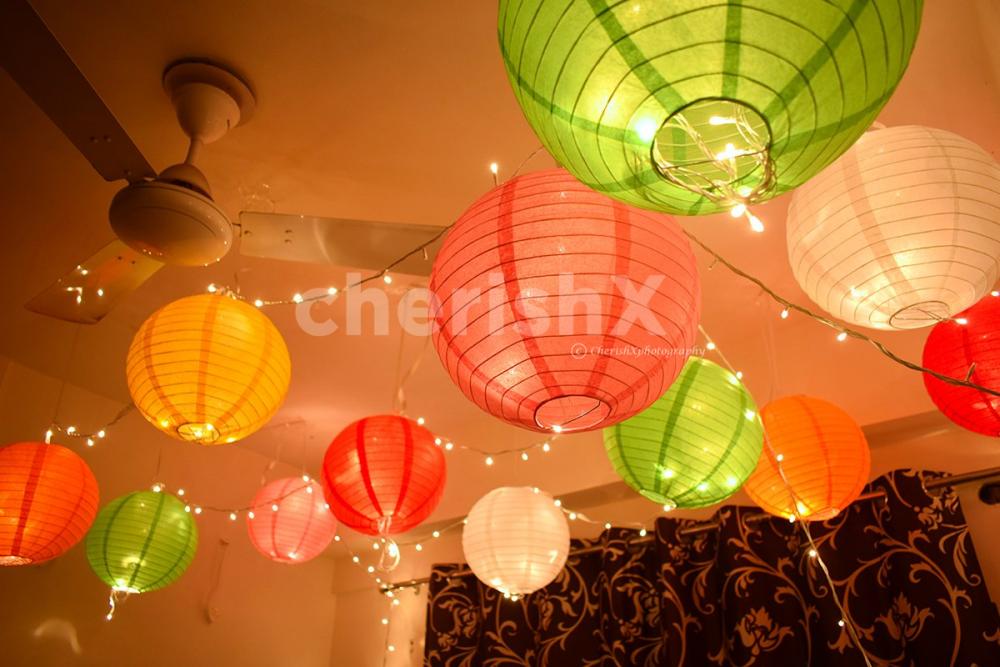 Embellish these Delicate Paper Lanterns into your room by booking CherishX's Colourful Lantern Decor.