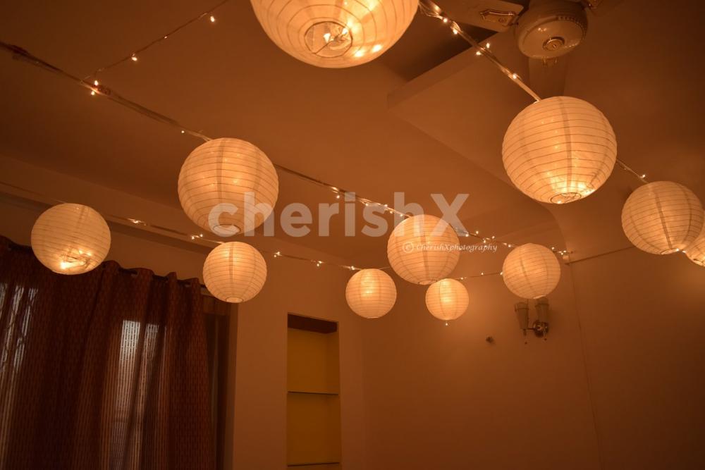 Decoration in Room with Lanterns and Fairy Lights.