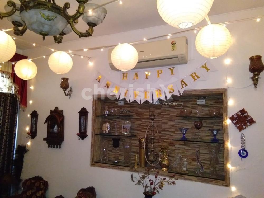 Decoration in Room with Lanterns and Fairy Lights.