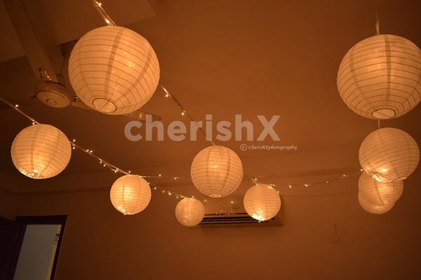 A beautifully decorated room with Lanterns for birthday or anniversary.