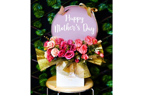 Our Pastel Pink Mother's Day Flower Bucket promises to make your celebration exciting