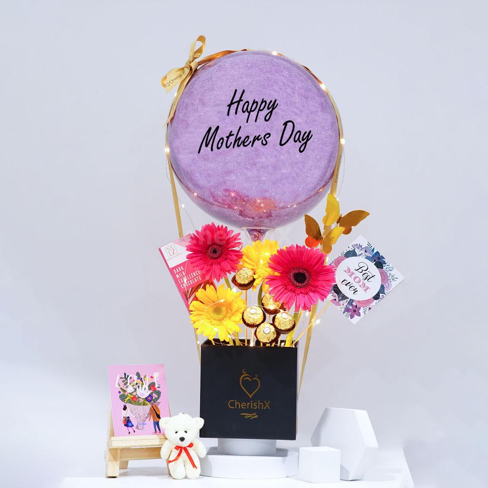 This Mother’s Day is unique and so is our beautiful pastel purple glitter balloon bucket!