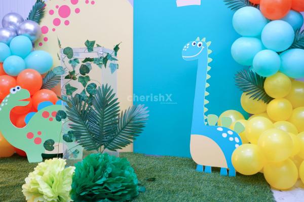 The kids will get hooked on the cake table decorated with the money plant bells.