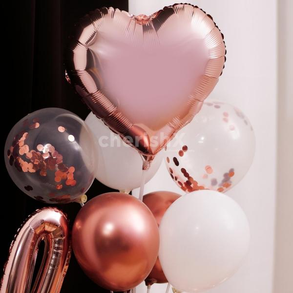 Elegance and classy are the best describing elements of this special rose gold love balloon bouquet
