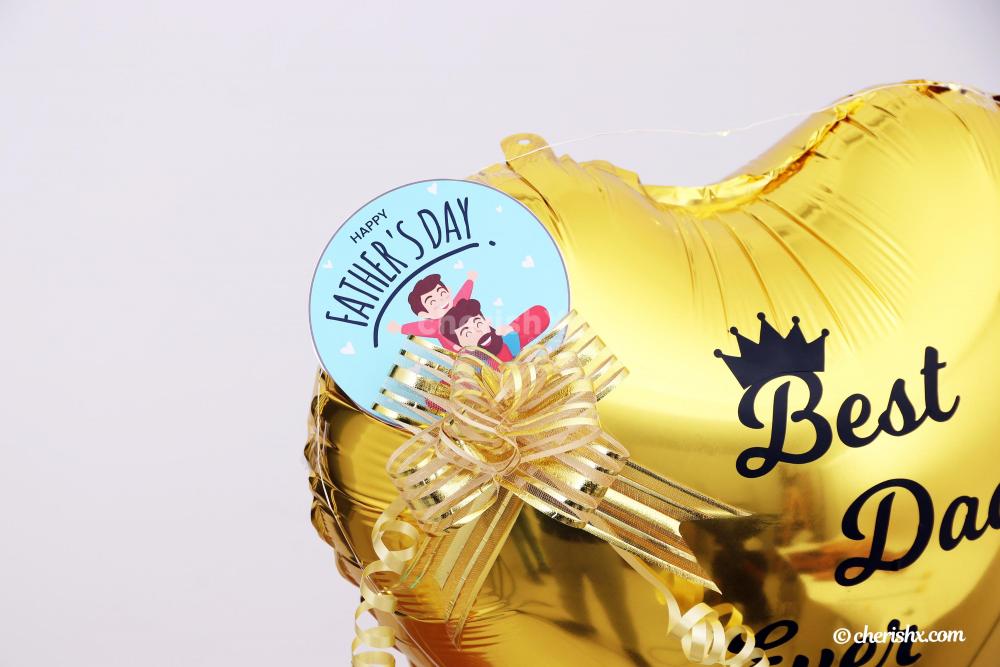 Happy Father's Day Message is also sticked to the heart-shaped Golden Foil Balloon.
