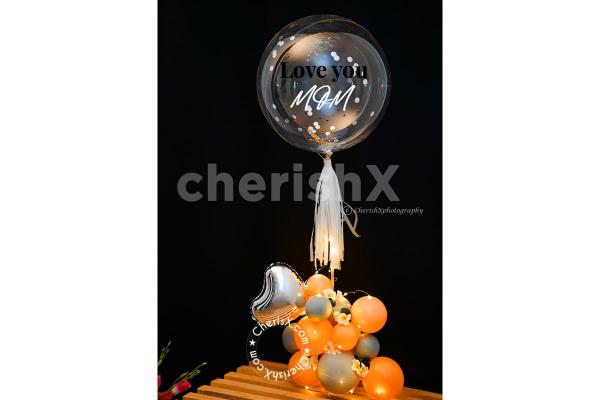 A Pastel Grey And Peach Balloon Bouquet by CherishX for Mother's Day Celebration Ideas!