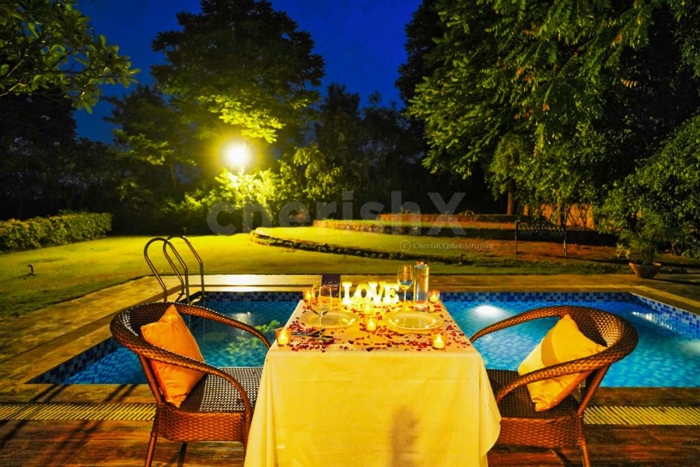 Discover the magic of a mesmerizing poolside dinner at Manesar Rosa Sangeet.