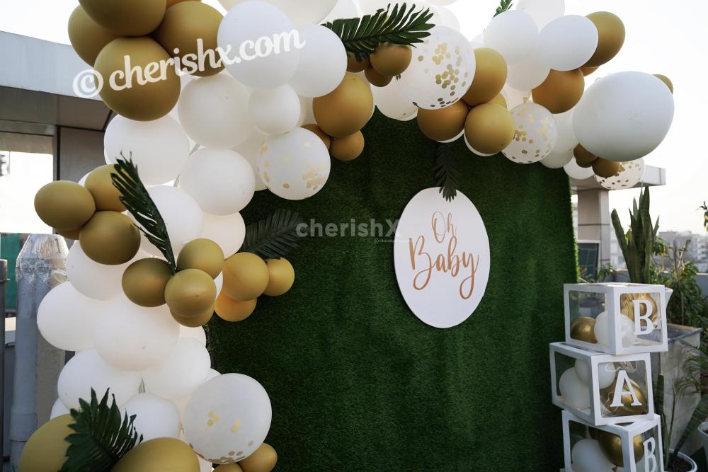 CherishX's Golden and White Baby Shower Decor lets you have a grand celebration. So, book this lovely decor to make your celebrations lovely!
