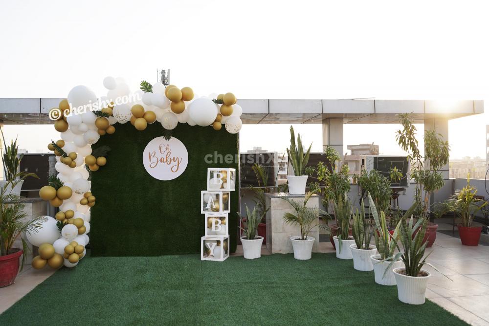Celebrate the birth of your child with this loving CherishX's Golden and White Baby Shower Decor!