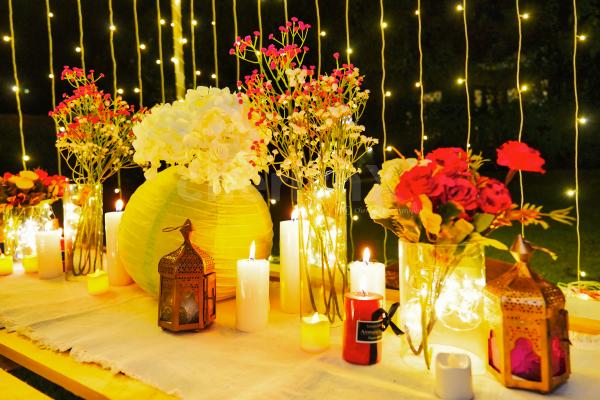 Flickering candles, delicate flowers, and shimmering lights create an ambience that will leave you in awe.