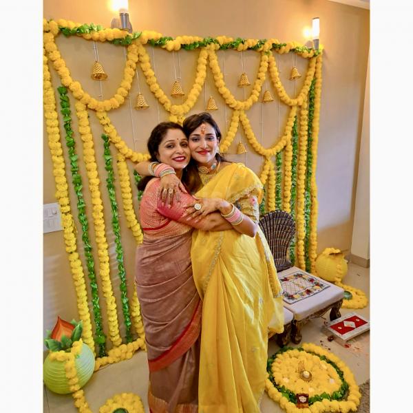 A whimsical haven crafted with marigold flowers and green garlands.