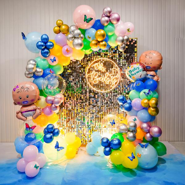The burst of colourful balloons against the backdrop creates an enchanting and playful ambience that is sure to bring smiles to everyone's faces.