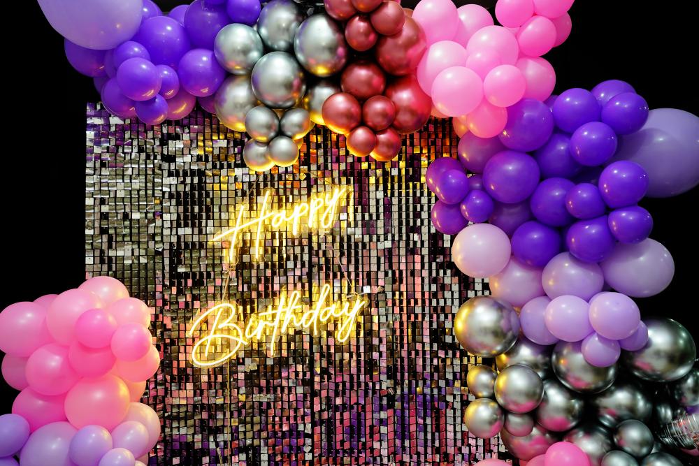 The silver sequin with balloon backdrop for your special party. | Bangalore